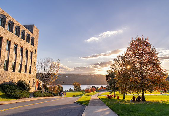 image of marist campus featuring foliage, the hudson river, and handcock building